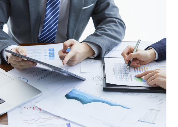 Reviewing financial charts and reports