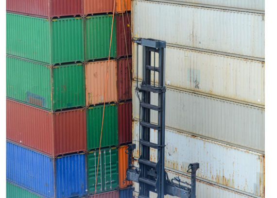 Stacked shipping containers at a freight yard