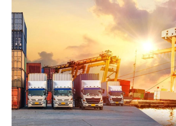 Freight trucks loading at a shipping port