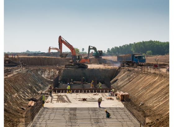 Workforce carrying out earthworks at a project site